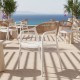 262-000050 Πολυθρόνα Ankara pakoworld στοιβαζόμενη pp-pe rattan σε λευκή-φυσική απόχρωση 54x55.5x77εκ